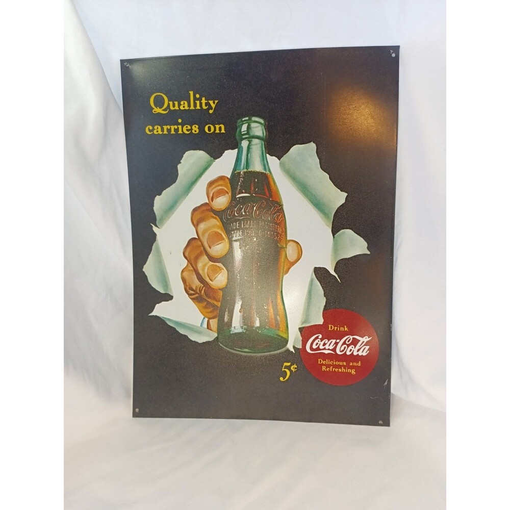 Vintage Coca-Cola “Quality Carries On” Metal Tin Sign
